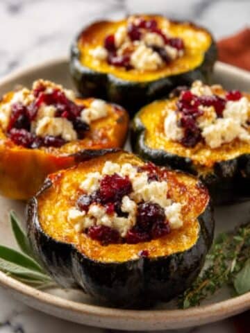 Honey-Glazed Acorn Squash with Creamy Goat Cheese and Cranberry Drizzle Recipe