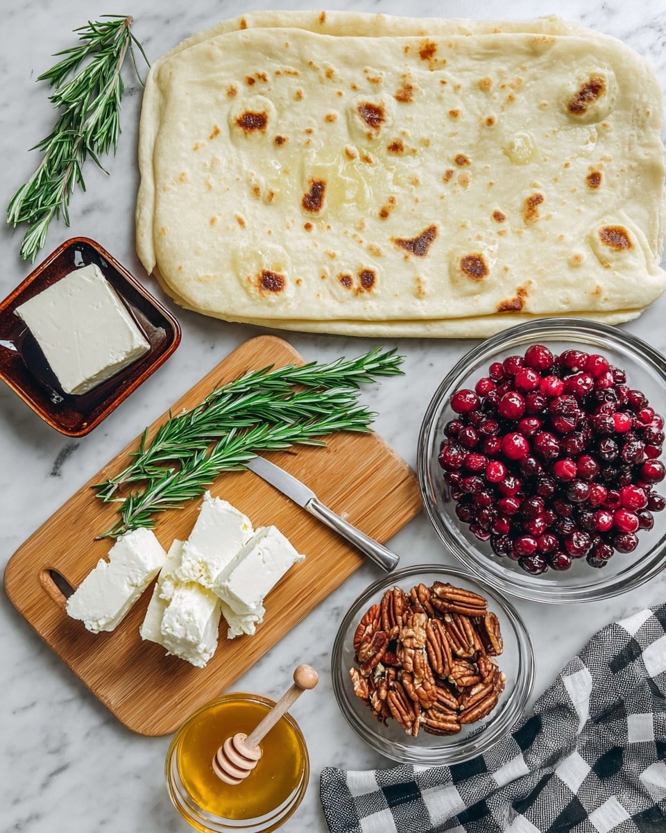 The image shows ingredients for a flatbread dish arranged on a white marbled surface. At the top is a large, pale flatbread with light brown spots spread out flat. Below it, on the left, is a small dark brown dish holding a block of white soft cheese with a knife resting on the edge. In the center, a light wooden board holds torn pieces of a soft white cheese and three bright green sprigs of rosemary. To the right of the board is a clear glass bowl filled with red and dark red fresh cranberries, and below it, another clear bowl contains chopped pecans. Above the wooden board, there is a small clear bowl of golden honey with a wooden honey dipper sticking out. A black and white checkered cloth is partially visible under the bowls on the right side. photo taken with an iphone --ar 4:5 --v 7