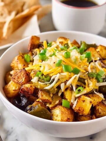 Make-Ahead Breakfast Bowls with Roasted Potatoes, Eggs, and Cheddar Recipe