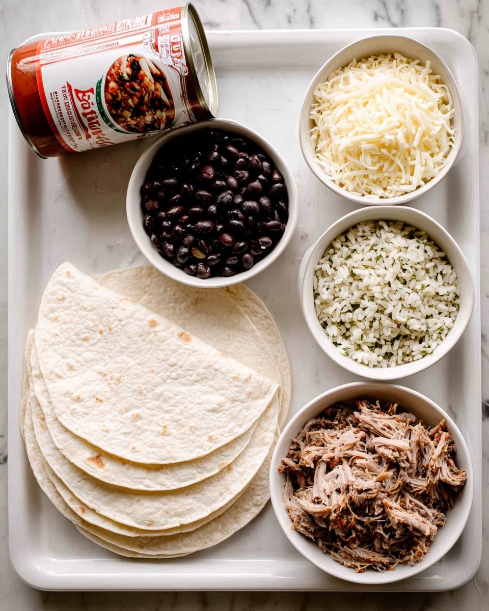 A white tray holds several ingredients for a meal. On the left, there are four white tortillas stacked with a can of red enchilada sauce leaning against them, the can is white with red and a picture of enchiladas on it. To the right of the tortillas are three white bowls. The top left bowl is filled with black beans, small, shiny, and dark. The top right bowl holds shredded white cheese with a soft, fine texture. The larger bowl below these contains shredded cooked meat, brown and stringy with a moist look. At the bottom right, there is a small white bowl of cooked rice mixed with herbs, giving it a light green and beige color. All items are placed on a white marbled surface. Photo taken with an iphone --ar 4:5 --v 7