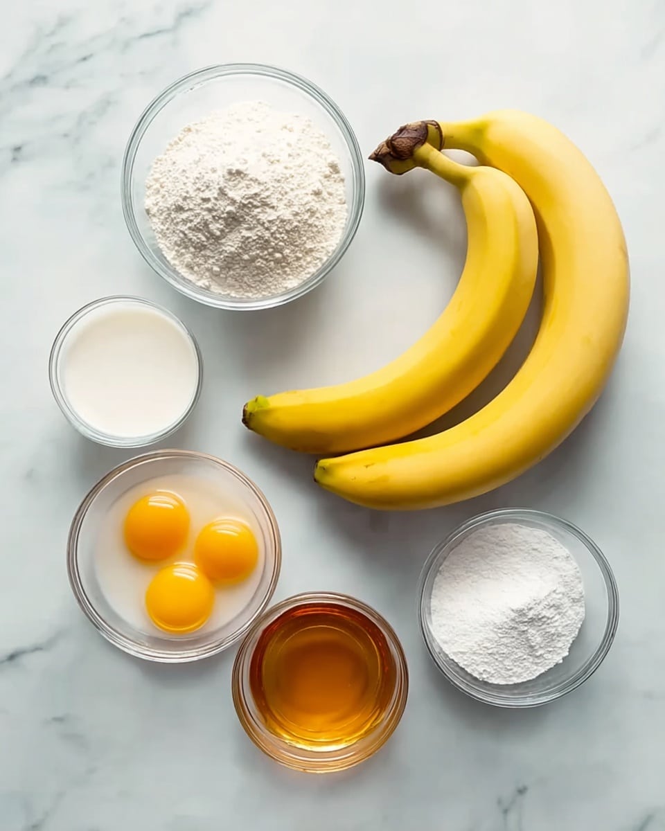 Two whole yellow bananas lie side by side on a white marbled surface, slightly curved with their brown stems pointing to the right. To the right of the bananas are five bowls arranged loosely in a circular shape. In the top right, there is a white bowl filled with white milk. Below it, a clear glass bowl holds white granulated sugar. To the lower left of that, another clear glass bowl contains white flour. Above the flour, a white bowl holds two raw eggs with bright yellow yolks and translucent whites. At the bottom right of the circle, a clear glass bowl contains golden honey. The image is bright and clean, with soft natural light and soft shadows. Photo taken with an iphone --ar 4:5 --v 7