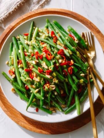 Snap Pea Salad with Chili Oil, Lime, and Nuts Recipe