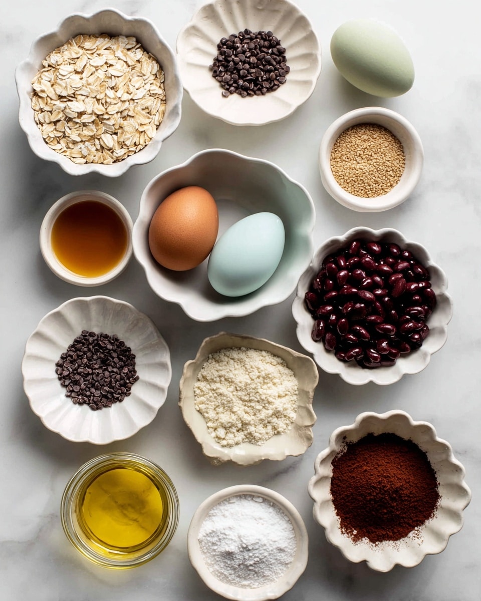 A top view of multiple white scalloped bowls and small dishes arranged on a white marbled surface, each containing a different ingredient: one bowl with light beige oats, another with dark red black beans, a small bowl holding two eggs—one light brown and one pale blue, a white bowl filled with golden maple syrup, a tiny dish of fine instant espresso granules, another small dish with white salt, a small bowl of dark brown chocolate chips, a jar filled with clear yellow avocado oil, a small scalloped dish with white baking powder, a white bowl containing rich brown cocoa powder, and a tiny dish of dark vanilla extract. The ingredients are neatly spaced and labeled. photo taken with an iphone --ar 4:5 --v 7