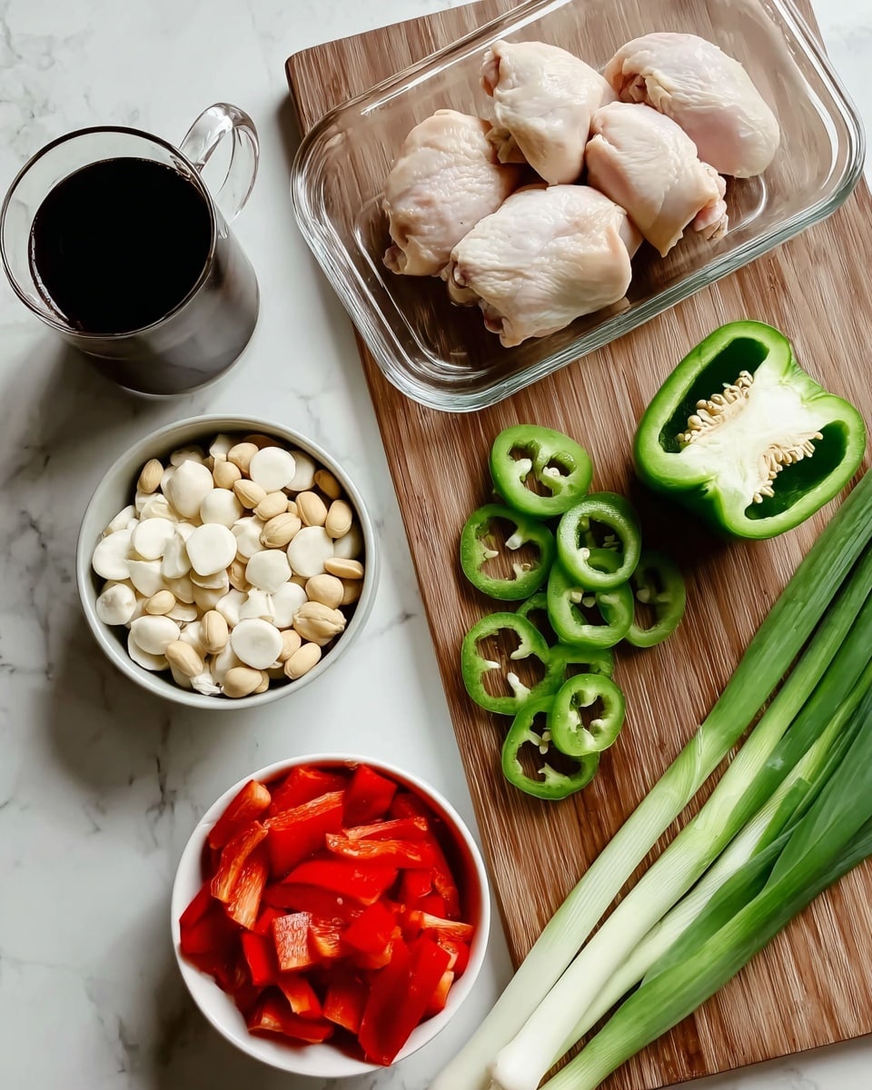 The image shows a white marbled surface with a wooden cutting board on the right, holding a green bell pepper cut in half with seeds visible, several green sliced rings of the pepper, and a cluster of green onions with white bulbs on the bottom and long green stalks extending upward. To the left of the cutting board, there is a rectangular clear glass dish containing three pieces of raw pale chicken thighs stacked neatly. Below this, a metal bowl filled with small round white discs, likely sliced water chestnuts, sits next to a white bowl filled with light brown peanuts and another white bowl filled with bright red sliced bell peppers. A clear glass mug containing dark soy sauce or similar liquid is placed in the left center area. Everything is laid out clearly for cooking preparation. photo taken with an iphone --ar 4:5 --v 7