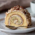Poppy Seed Roulade with Dulce de Leche, Toasted Coconut, and Chocolate Shavings Recipe
