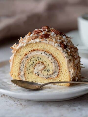 Poppy Seed Roulade with Dulce de Leche, Toasted Coconut, and Chocolate Shavings Recipe