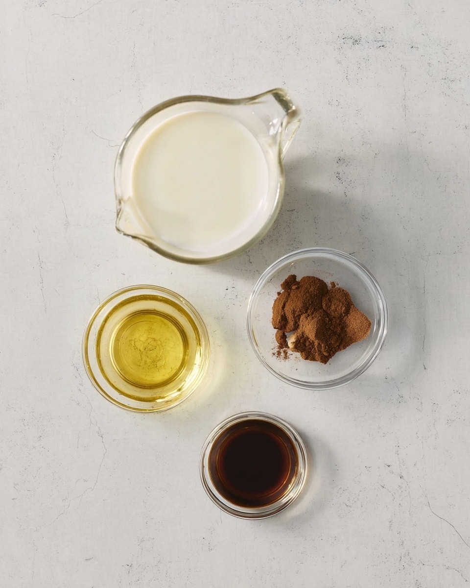 A clear glass pitcher filled with white liquid is at the top center, below it to the left is a small clear glass bowl with a golden yellow liquid, to the right of that bowl is another small clear glass bowl filled with medium brown powder, and below them is a small clear glass bowl with a dark brown liquid, all placed on a white marbled surface photo taken with an iphone --ar 4:5 --v 7