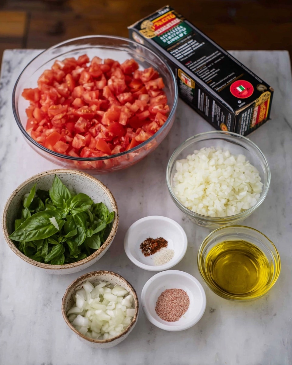 The image shows six containers of cooking ingredients arranged on a white marbled surface. At the back, there is a box of spaghetti pasta in black packaging with red and yellow labels. In front of the box, a large clear glass bowl holds a generous layer of small diced red tomatoes, filling it up almost to the top. To the right, a small white bowl contains a layer of minced garlic with a slightly creamy texture. Below that, a small white dish holds three seasonings: white salt, light pink salt, and red chili flakes. In the center front, a medium-sized clear glass bowl is filled with finely chopped white onions. To the left front, a small white bowl with a speckled brown rim is filled with fresh green basil leaves. Finally, a small clear measure glass filled with golden olive oil sits near the center right. The ingredients are neatly arranged, showing different colors and textures ready to be cooked photo taken with an iphone --ar 4:5 --v 7