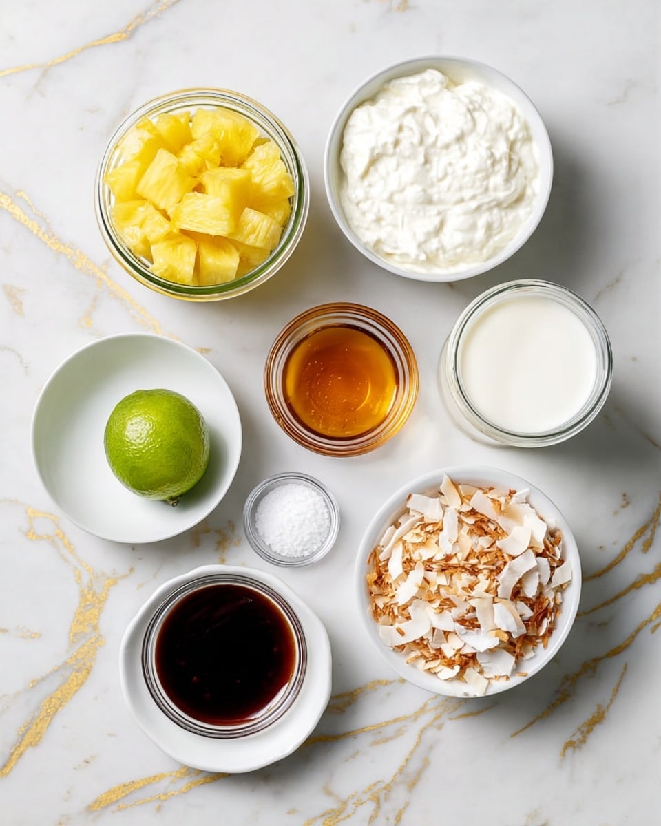 The image shows seven small white bowls and a glass jar arranged on a white marbled surface with gold streaks. Starting from the top left, there is a glass jar filled with bright yellow pineapple chunks, next to it on the right is a white bowl filled with thick, creamy white yogurt. Below the yogurt to the right is a glass jar of a white liquid, likely milk. Below the pineapple on the left is a white plate holding a half of a lime with a green outer skin and pale interior. Next to the lime at the center bottom is a small glass bowl filled with amber-colored honey. To the right of the honey is a small white bowl with white coarse salt. On the bottom left is a white plate with a thick dark brown sauce. Finally, on the bottom right corner, there is a white bowl filled with toasted coconut flakes that have a mix of white and golden-brown pieces. All items are cleanly presented with no clutter around, and the photo taken with an iphone --ar 4:5 --v 7